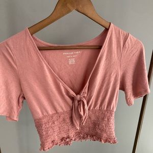 American Eagle rose coloured top size XS
